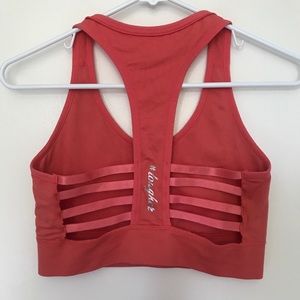 Yelete sports bra with zip on/off hood